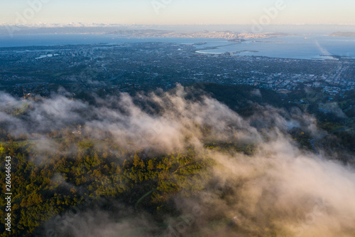 At sunrise, clouds drift over the East Bay hills in the San Francisco Bay area of California.