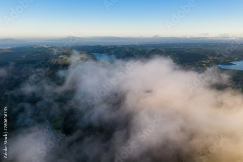 Aerial of Clouds Drifting Over East Bay Hills and Reservoirs in California