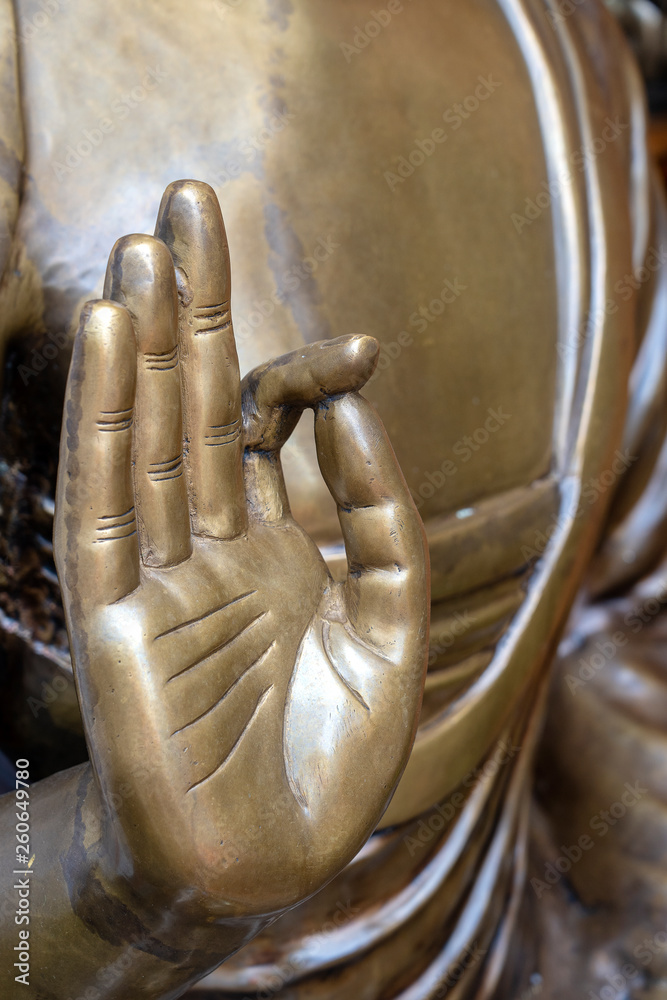 Beautiful bronze Buddha statue hand, close up