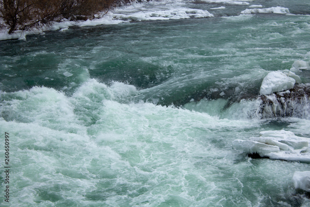 Rapid icy water at winter Niagara Falls Rapid icy water at winter Niagara Falls