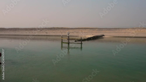 Aerial: Harbour and vacation park during hazy spring day. photo