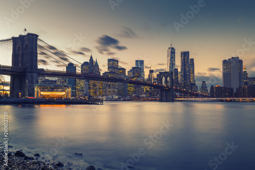 Brooklyn bridge East river and Manhattan after sunset  New York City