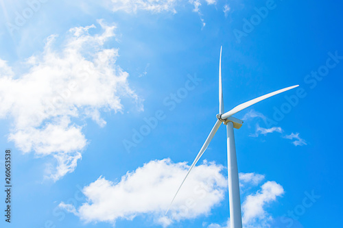 Wind turbines generate electricity and the bright blue sky at Khao Kho of phetchabun in Thailand.