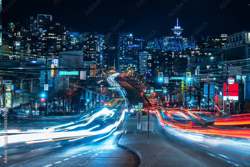 Naklejka premium light trails go out of the downtown vancouver
