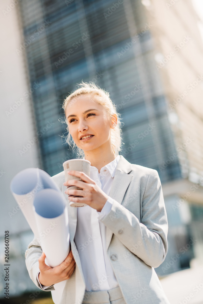 Businesswoman on her way to work. Young manager having coffee. Businesswoman on her way to work. Young manager having coffee.