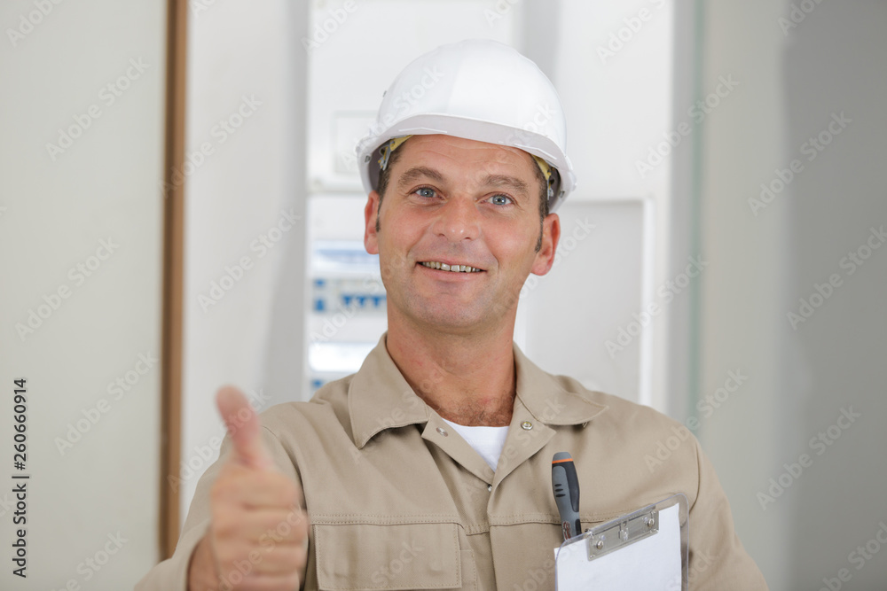 optimistic worker builder man shows thumb up optimistic worker builder man shows thumb up
