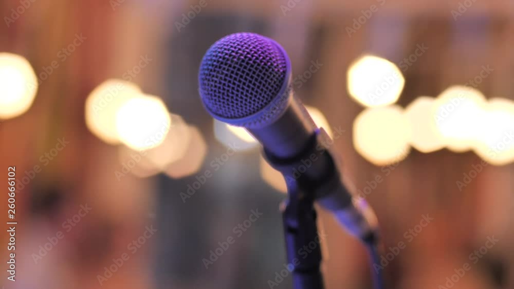 Microphone on the rack behind the lights of light. Microphone on the rack behind the lights of light.