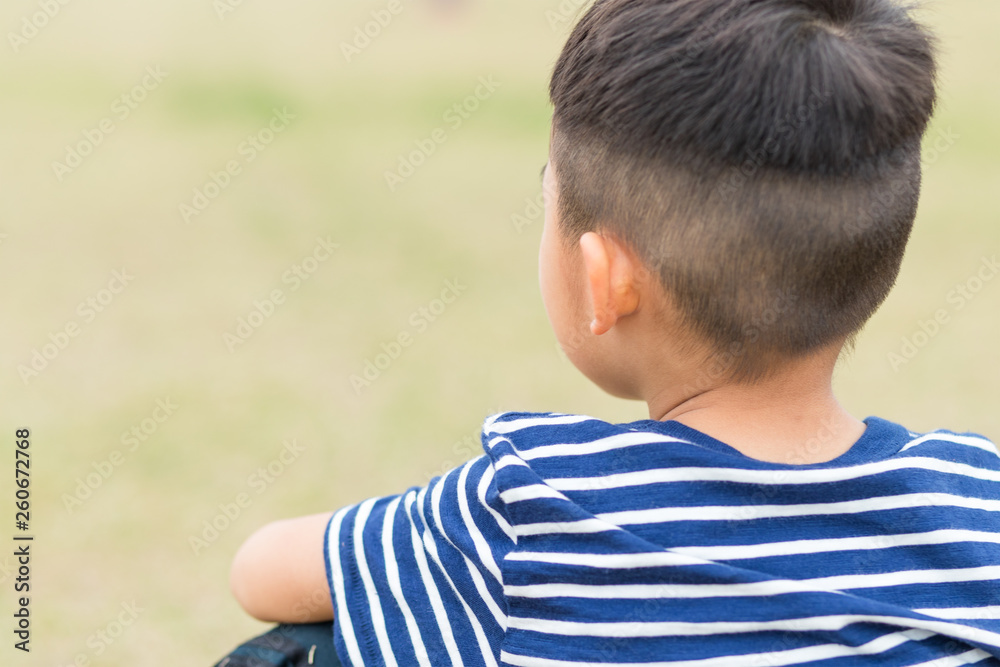 Back rear view of Little boy in the park Back rear view of Little boy in the park