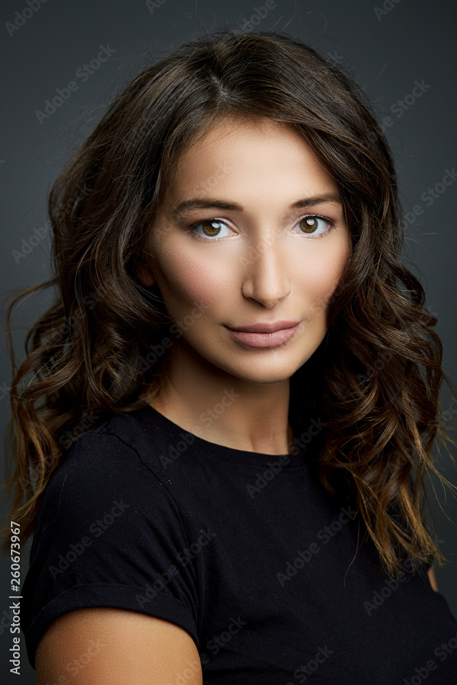 Close up beauty portrait on a gray background Close up beauty portrait on a gray background