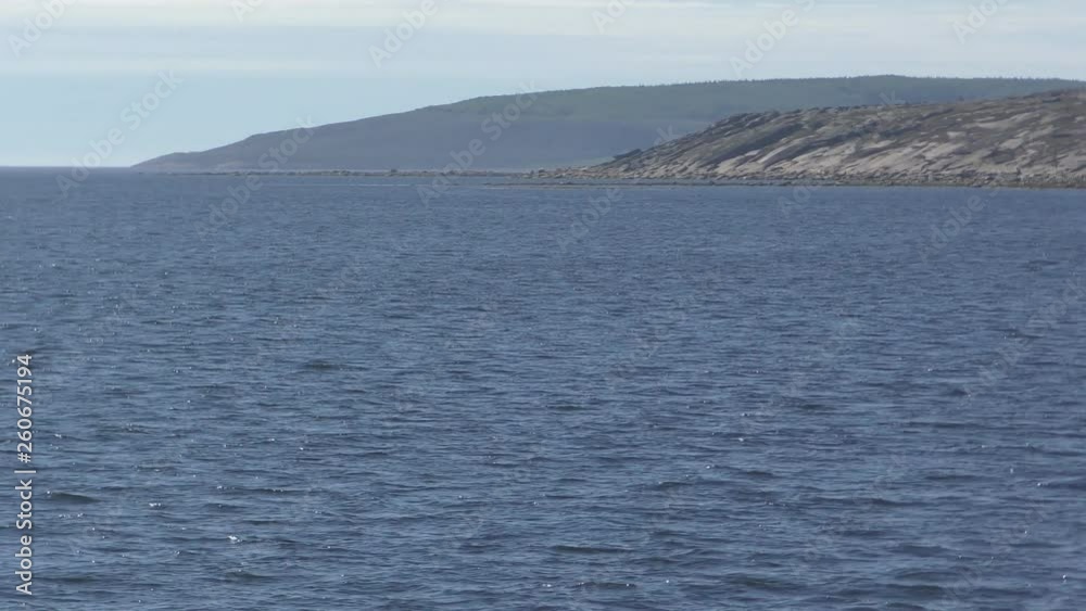 Islands of the Kuzova Archipelago in the White Sea on a summer day Islands of the Kuzova Archipelago in the White Sea on a summer day