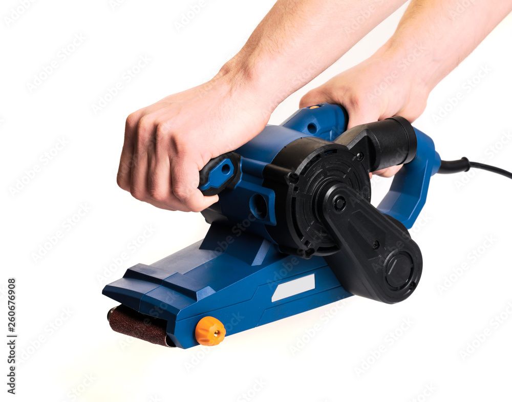 Fototapeta premium sandar tool with mans hands isolatd on white background
