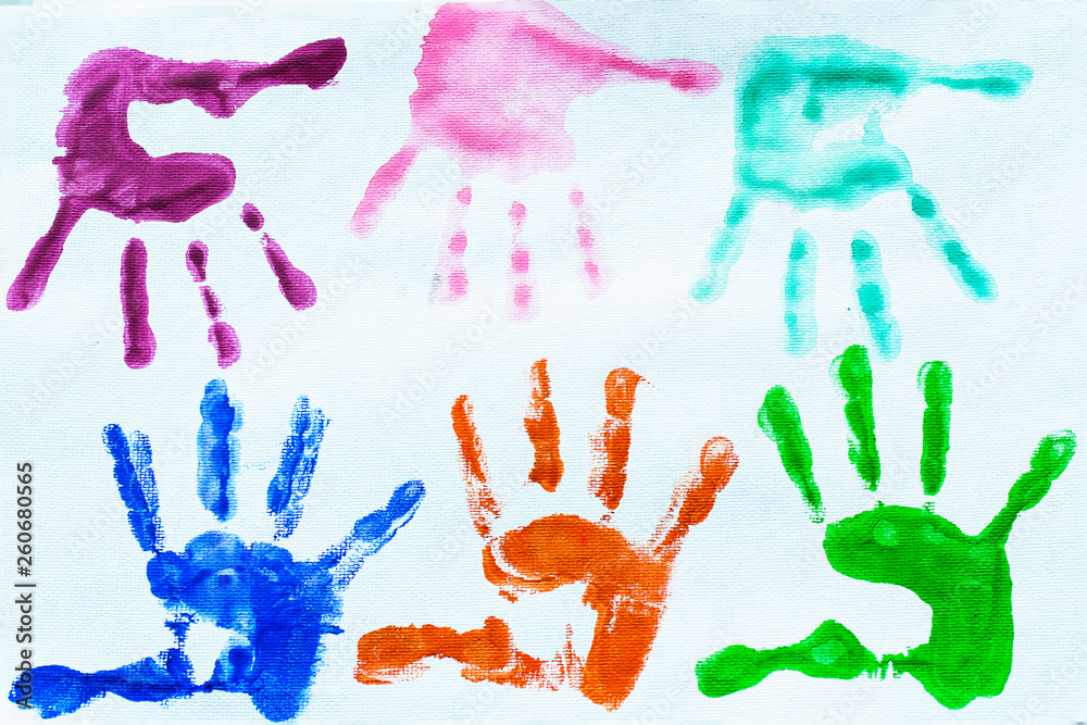 colorful hand prints of human hands isolated on white background colorful hand prints of human hands isolated on white background