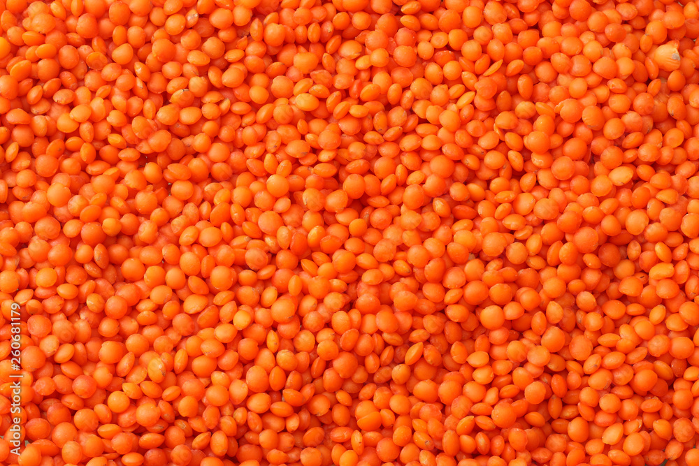 red lentils background. red lentils texture. Top view.
