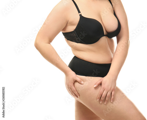 Overweight woman on white background © Pixel-Shot