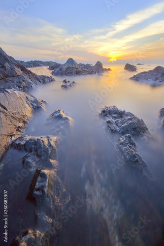 Beautiful sunrise at Pandak Beach, Malaysia in black and white image