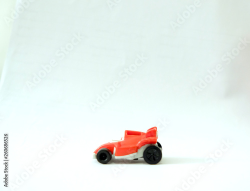 Toy race car on a white background © Spenelo