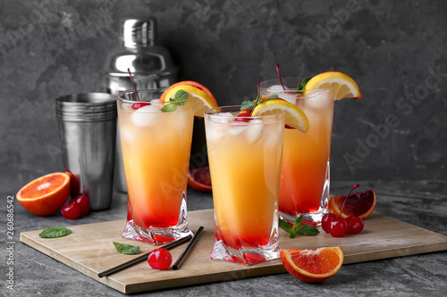 Foto Glasses of Tequila Sunrise cocktail on table
