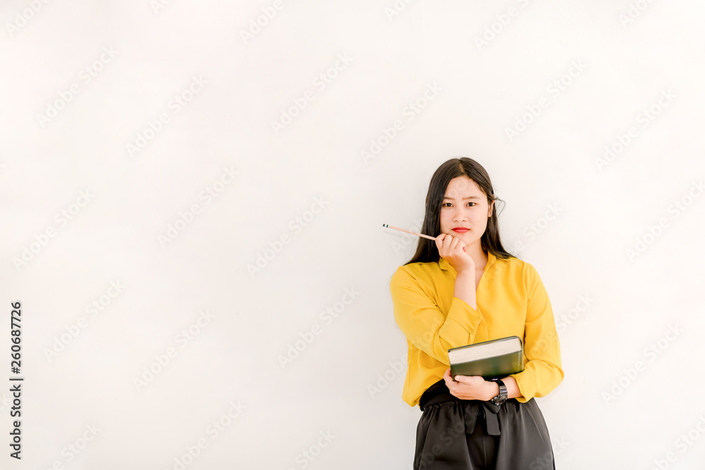 Asian college girls holding books separately on white Asian college girls holding books separately on white