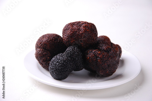 chocolate truffles on a plate © WENYUE