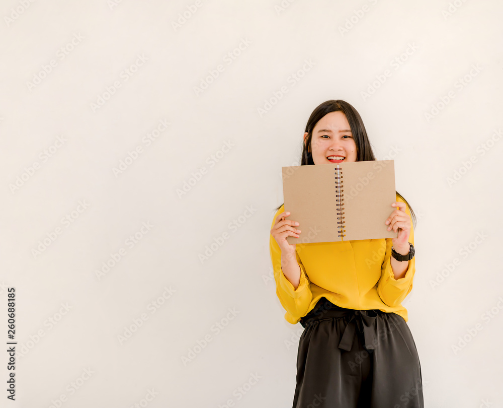 The image of a beautiful Asian woman smiling brightly on a white background The image of a beautiful Asian woman smiling brightly on a white background