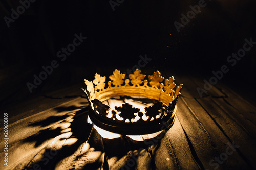 Crown in the center on a black background. Game of Thrones. photo