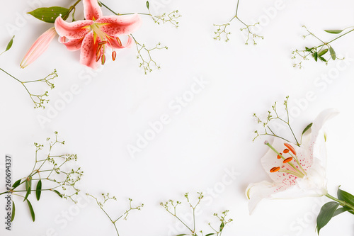 A bouquet of coral flowers on white boards