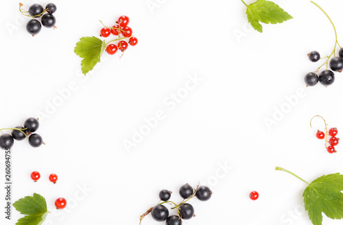 Fresh blueberries, red and black currants, gooseberries, summer berry ornament on a white background