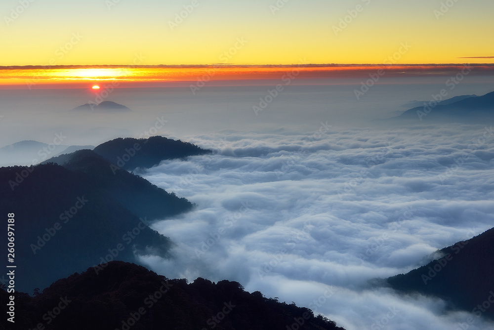 Sunset over the sea of clouds