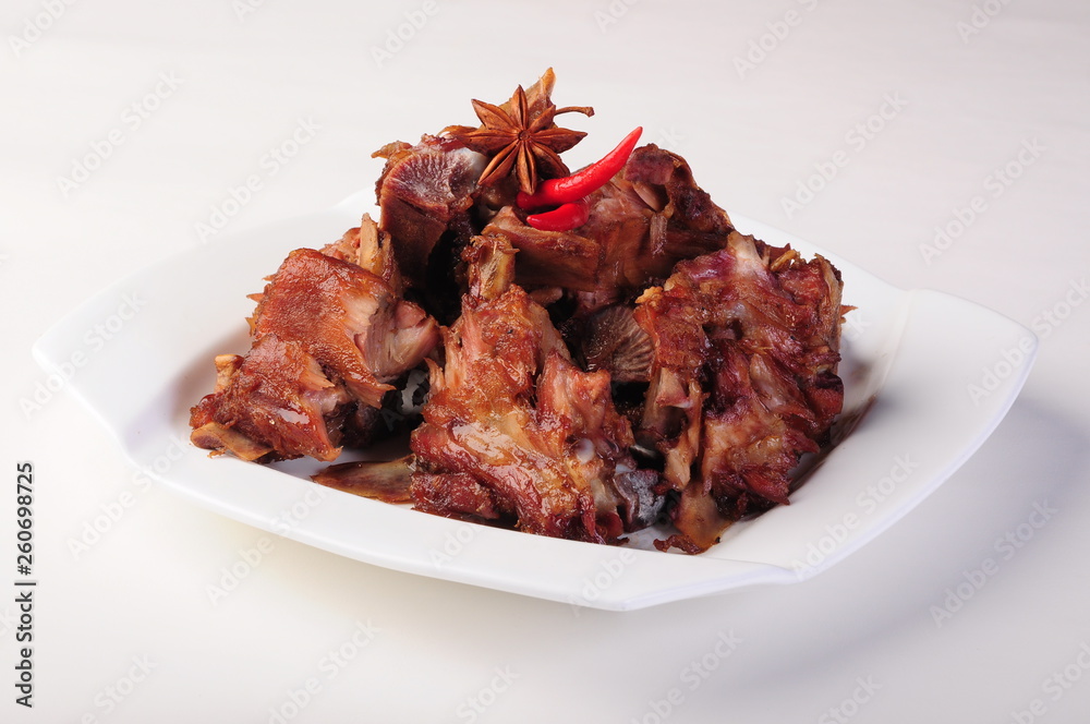 meat with vegetables on white plate