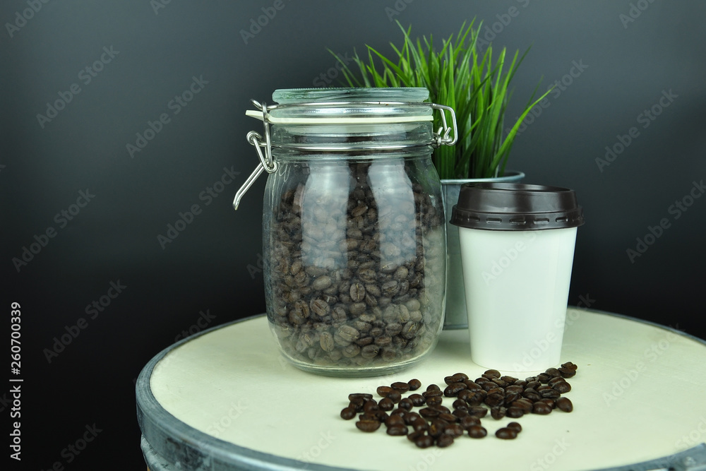coffee bean and hot coffee in paper glass coffee bean and hot coffee in paper glass