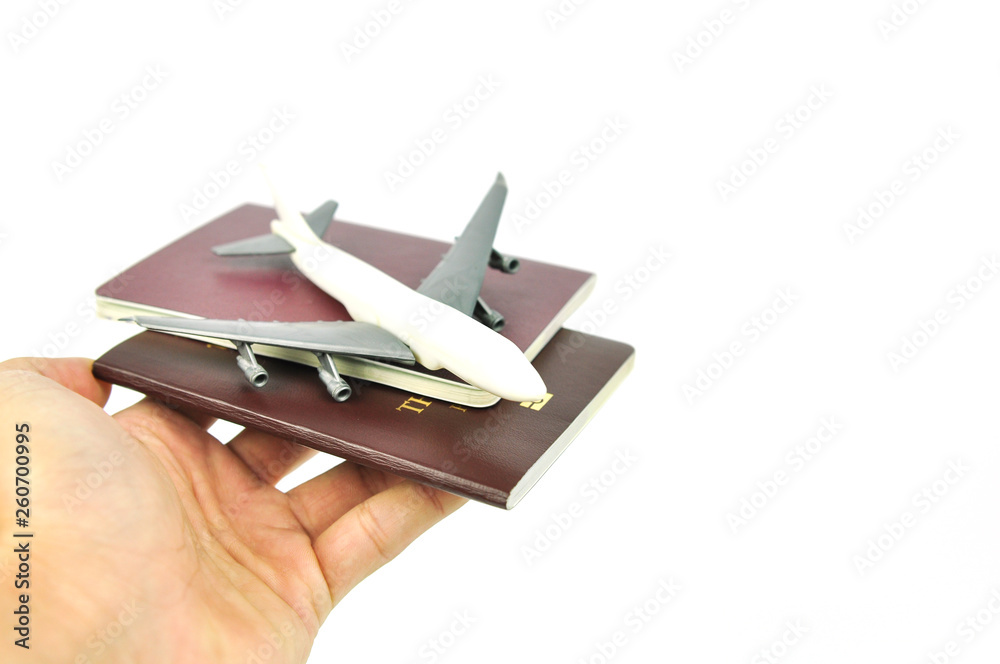 passport and toy airplane. travel concept passport and toy airplane. travel concept
