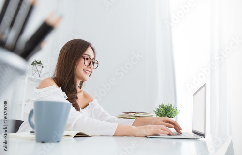 Portrait of beautiful business asian woman working in office computer. Business people freelance online marketing telemarketing concept
