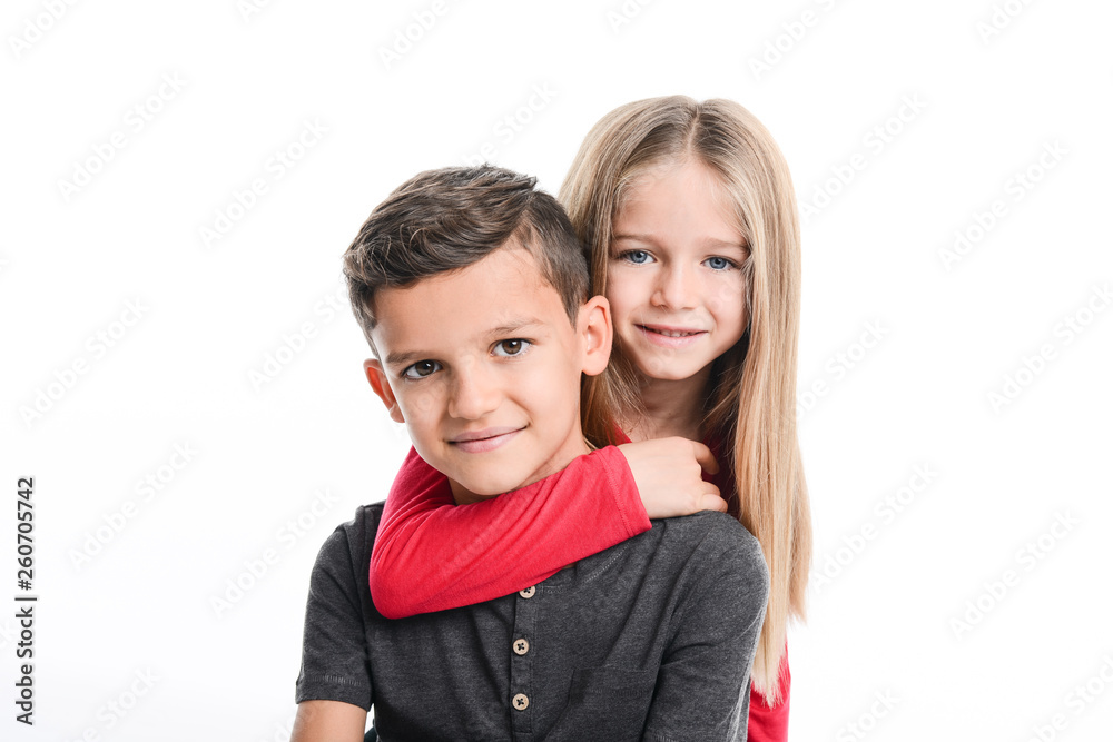 portrait of two young kids boy and girl sibling in studio shot on white background portrait of two young kids boy and girl sibling in studio shot on white background