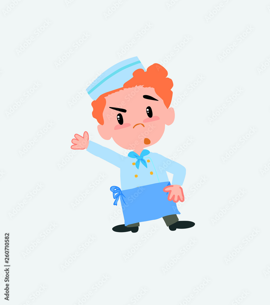 Chef something angry shows something to his right.