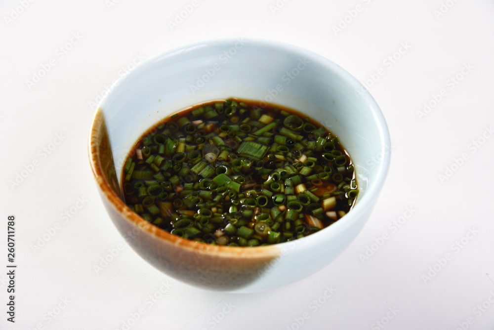 black pepper in a bowl isolated on white black pepper in a bowl isolated on white