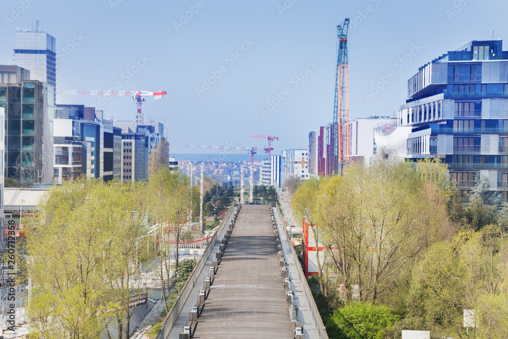 Parisian cityscape with skyscrapers and cranes, France Parisian cityscape with skyscrapers and cranes, France
