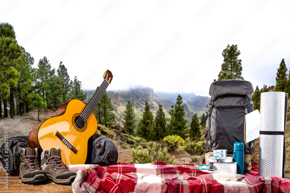 Obraz premium Backpack and mountains landscape 