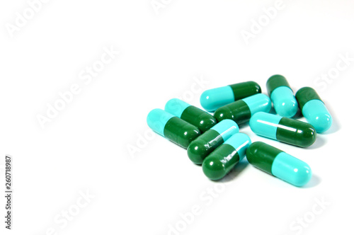 drug capsules on white backgrround