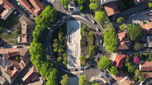 Roundabout with traffic aerial vertical drone shot Nîmes Jean jaures avenue spring time sunny day  photo