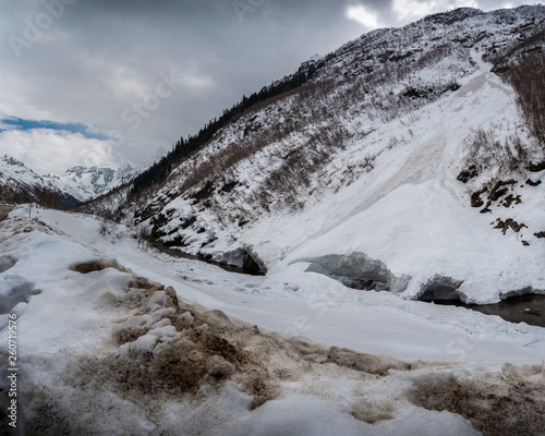 avalanche on the mountain river Gonachkhir in Dombay, Karachay-Cherkessia, Russia