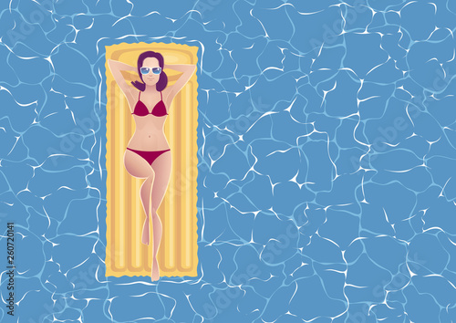 Summer Sea Vacation. Aerial view at a young adult woman carefreely sunbathing in bikini on inflatable mattress which is swimming on a water surface of a pool or a sea.