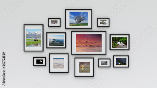 Photo frame on wall (3d rendering)