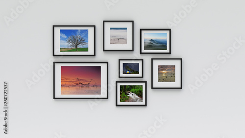 Photo frame on wall (3d rendering)