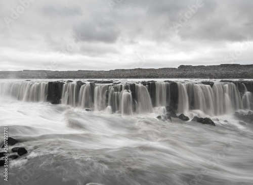 Black and white long exposure image of Selfoss waterfall on Jokulsa a Fjollum river in Iceland