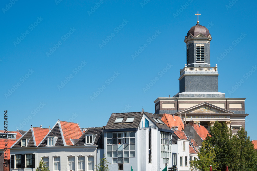 cityscape, Hartebrug  Church, houses, tower, in Leiden,  The Netherlands. blue sky, space for text
