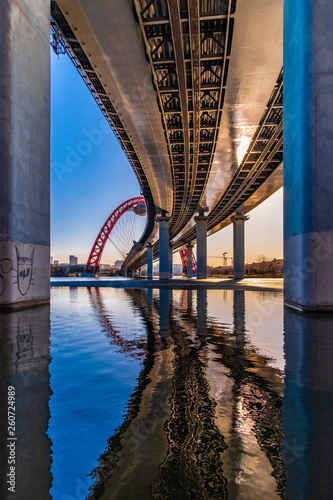 The Stroginsky Bridge in Moscow is an automobile-tram bridge across the Moscow River that connects the regions of Shchukino and Strogino to the North-West District of Moscow. photo