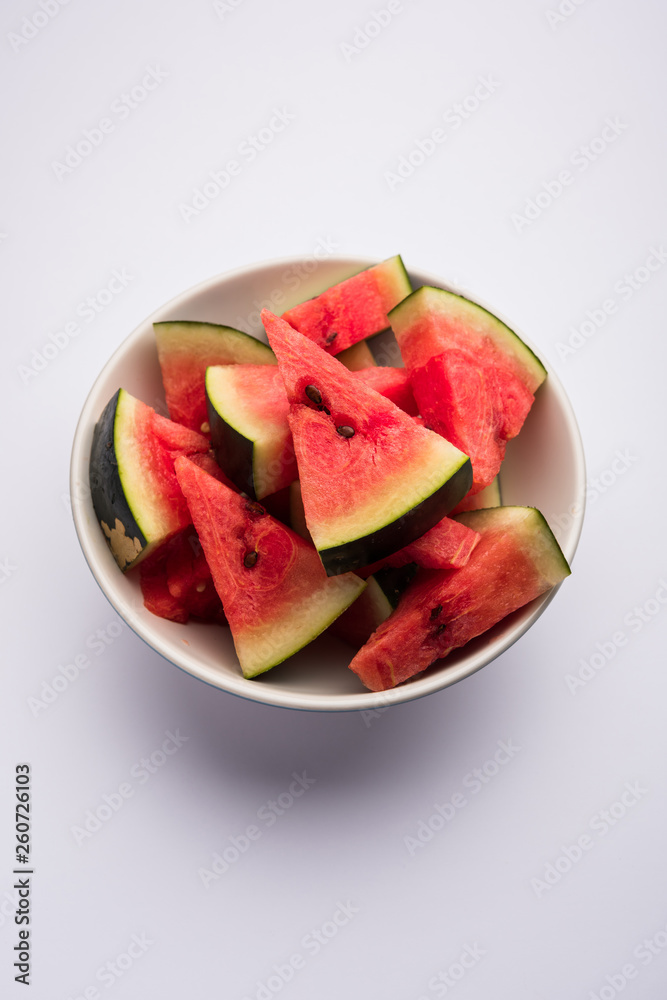 Watermelon / tarbooj fruit cube slices served in a bowl. selective focus Watermelon / tarbooj fruit cube slices served in a bowl. selective focus