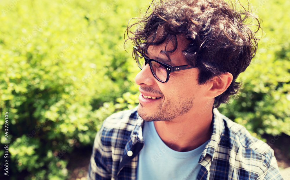 lifestyle, emotion, expression and people concept - close up of happy smiling man in eyeglasses outdoors lifestyle, emotion, expression and people concept - close up of happy smiling man in eyeglasses outdoors
