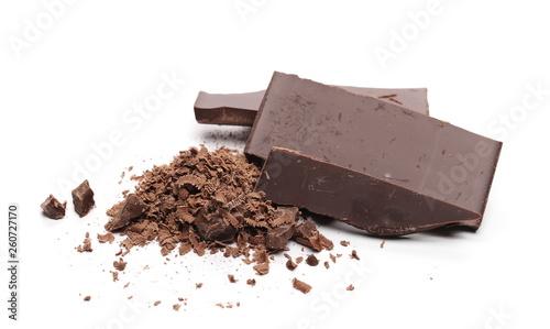 Chocolate bars, pieces with shavings isolated on white background