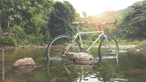 adventure bicycle in river